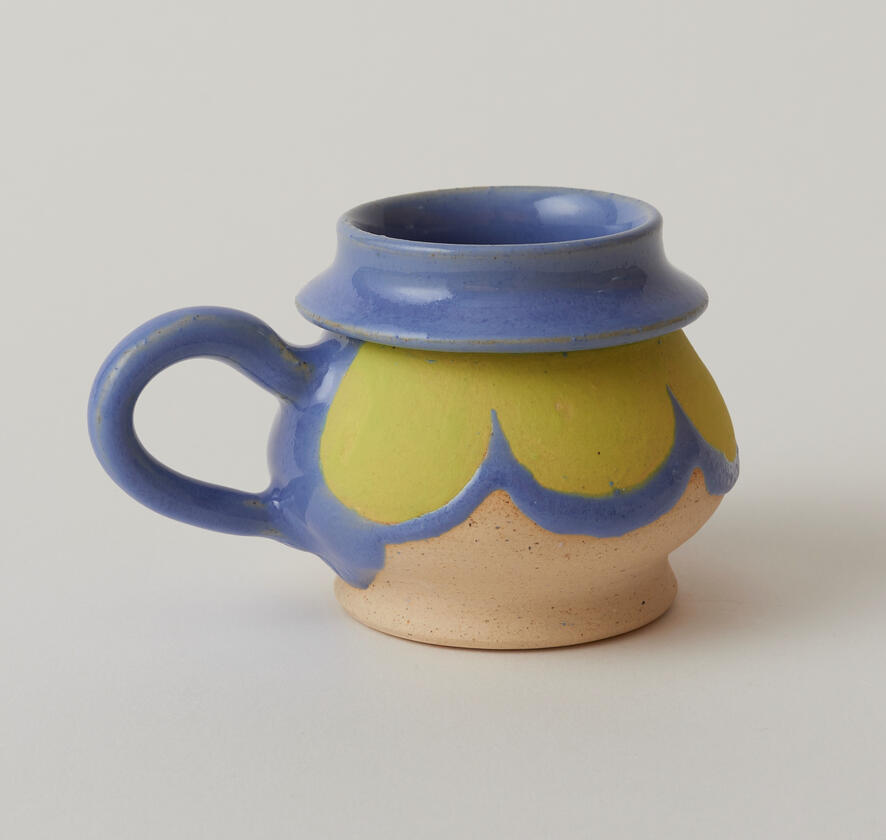 Blue and green ceramic mug.